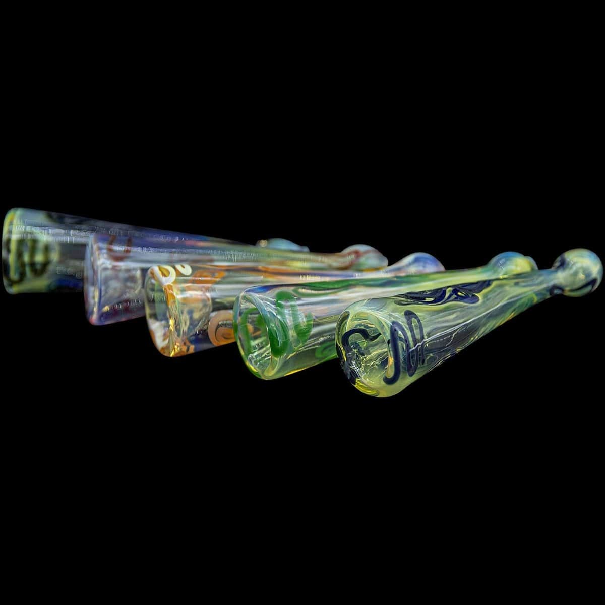 A close-up, angled view of the “Warrior Piper” Inside-Out Funnel Chillum Herb Pipe, showing its glass construction and compact size.