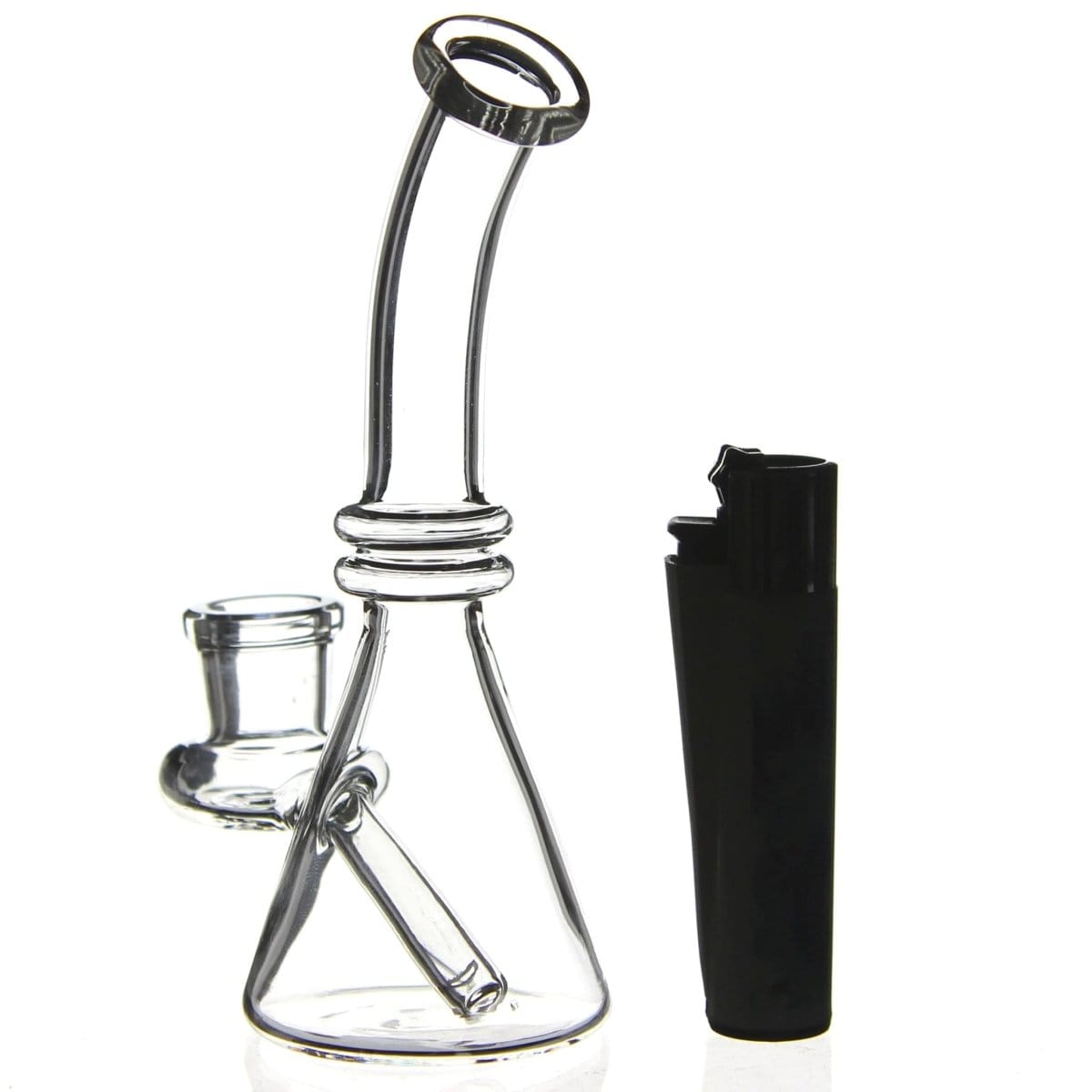 A front view of the Quartz Mini Dab Rig Collection, showing a small clear glass rig next to a black cylindrical object on a white surface.