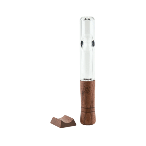 A side view of the Marley Natural Steamroller with a wooden mouthpiece, resting on a dark surface.
