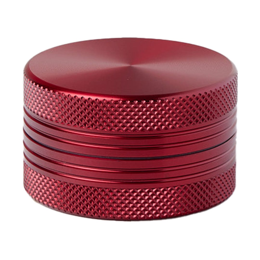 A close-up, angled view of the Meudsa Customs Flat Grinders, showcasing its metallic, layered design.