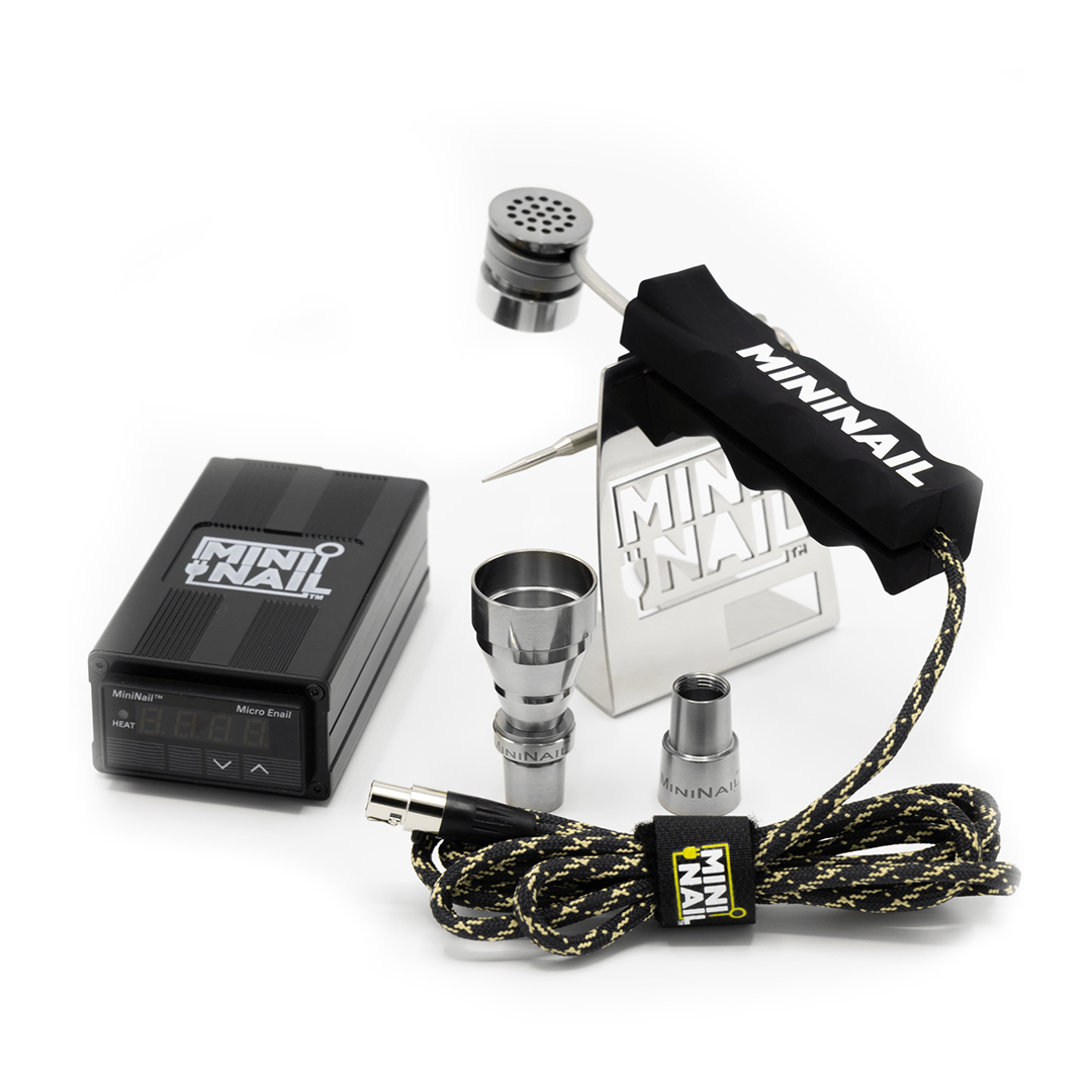 A close-up, angled view of the MiniNail Flower Wand Kit with a black housing and silver tip, connected to a black cable.