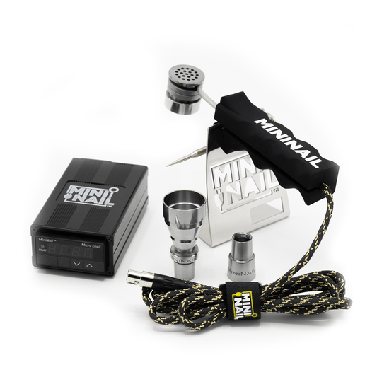 A close-up, angled view of the MiniNail Flower Wand Kit with a black housing and silver tip, connected to a black cable.