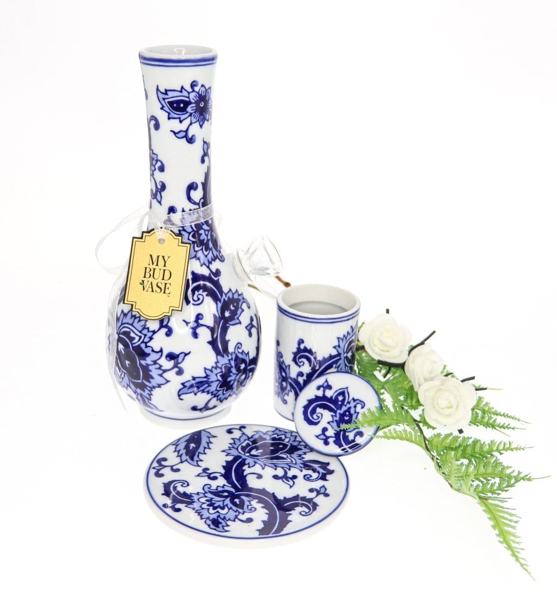 A detailed, eye-level shot of the “My Bud Vase “Joy” Chinese Porcelain Vase Bong Set” with a delicate floral arrangement next to it.
