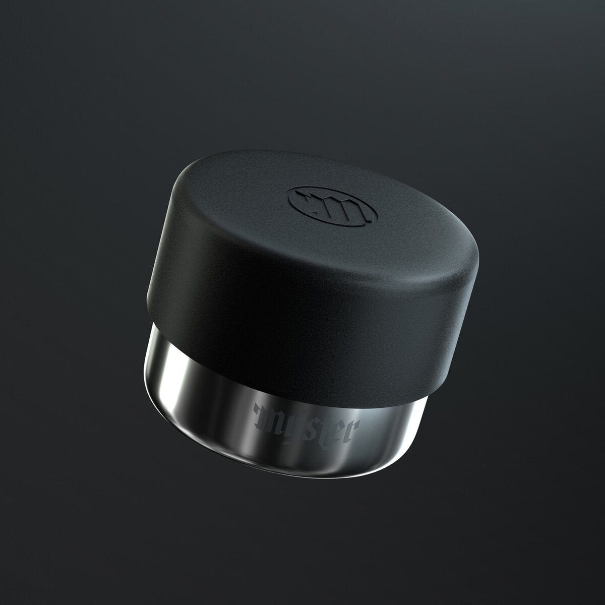 A sleek, low-angle shot of the Myster Mini Ashtray, showcasing its smooth, dark surface against a black background.