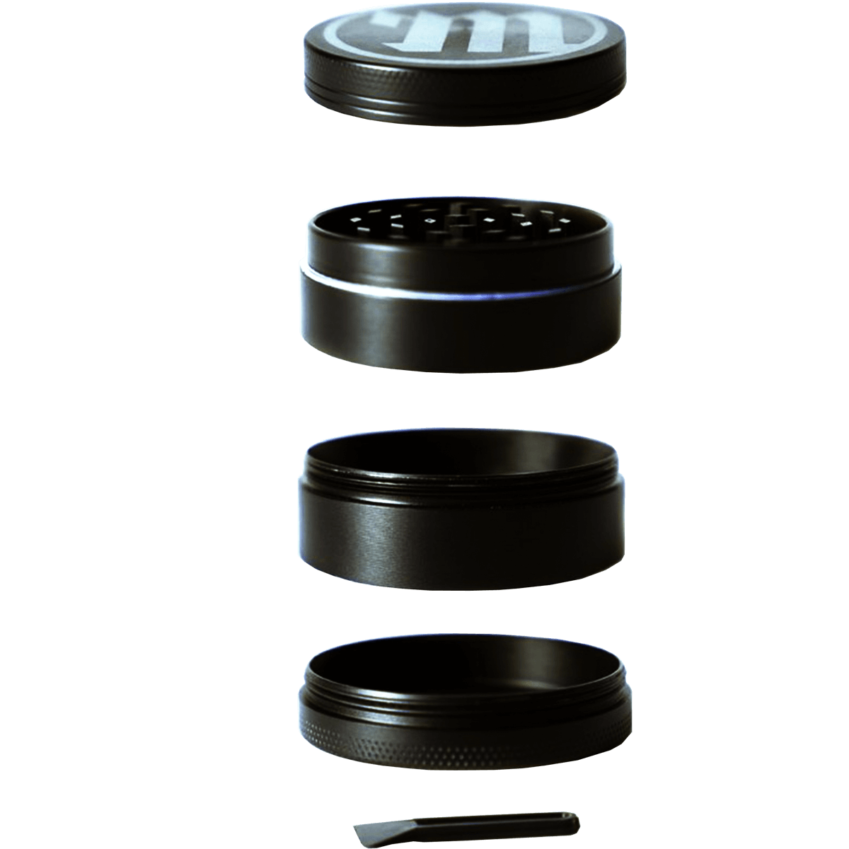 A top-down view of the four pieces of the Myster 4-Piece Grinder, stacked and showing a dark metallic finish.