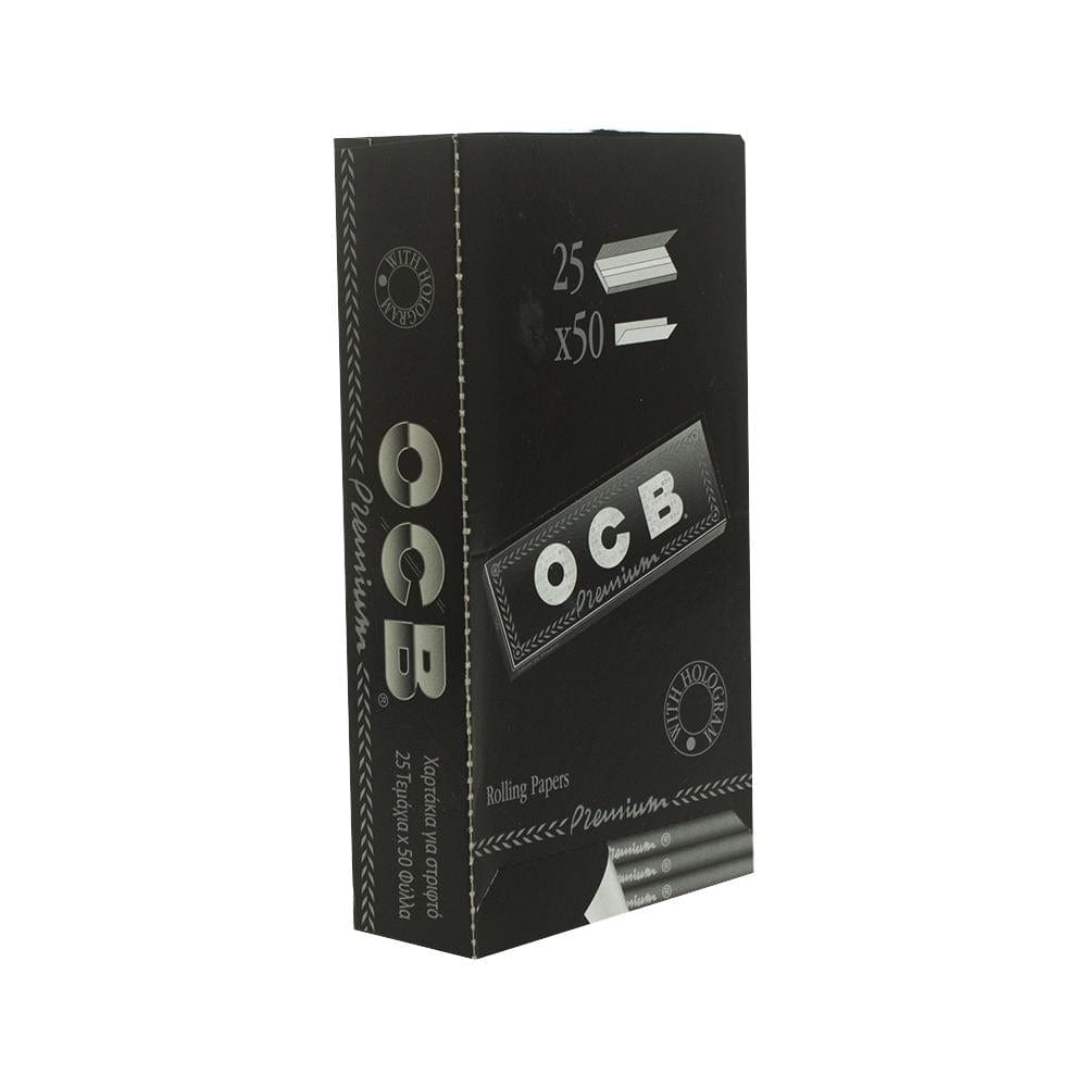 Front view of OCB - Premium Single Wide Rolling Papers package, showing text and a repeating pattern on a black background.