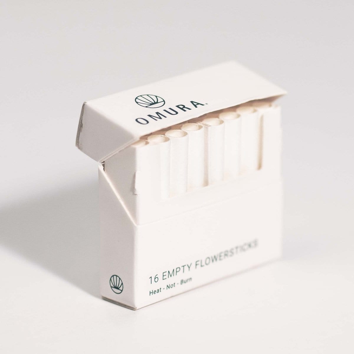 Omura Flowersticks displayed in a close-up, angled shot showing their simple packaging design.