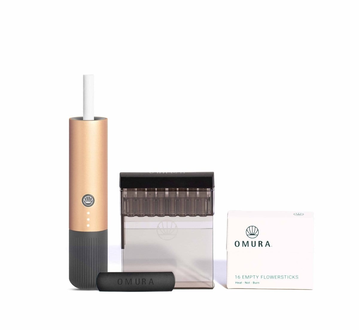 Front view of the Omura Series 1 Complete Bundle with a cylindrical device next to its packaging, highlighting a sleek, modern design.