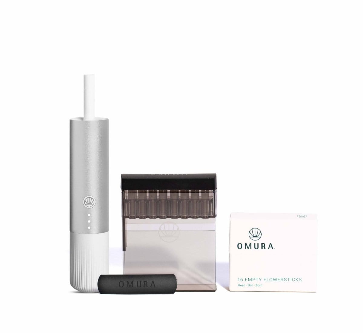 Front view of the Omura Series 1 Complete Bundle, showcasing a sleek, cylindrical device on a light grey surface.