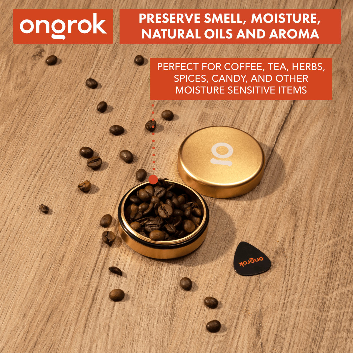 A top-down view of the ongero Aluminium Storage Puck surrounded by scattered dark coffee beans on a wooden surface.