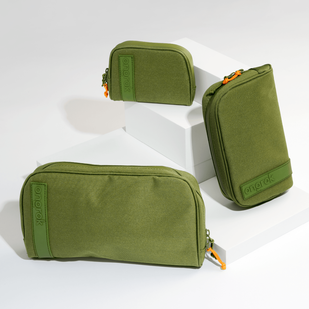 Front view of the three sizes of Carbon-lined Wallets with Combination Lock V 2.0| angled on a white background.