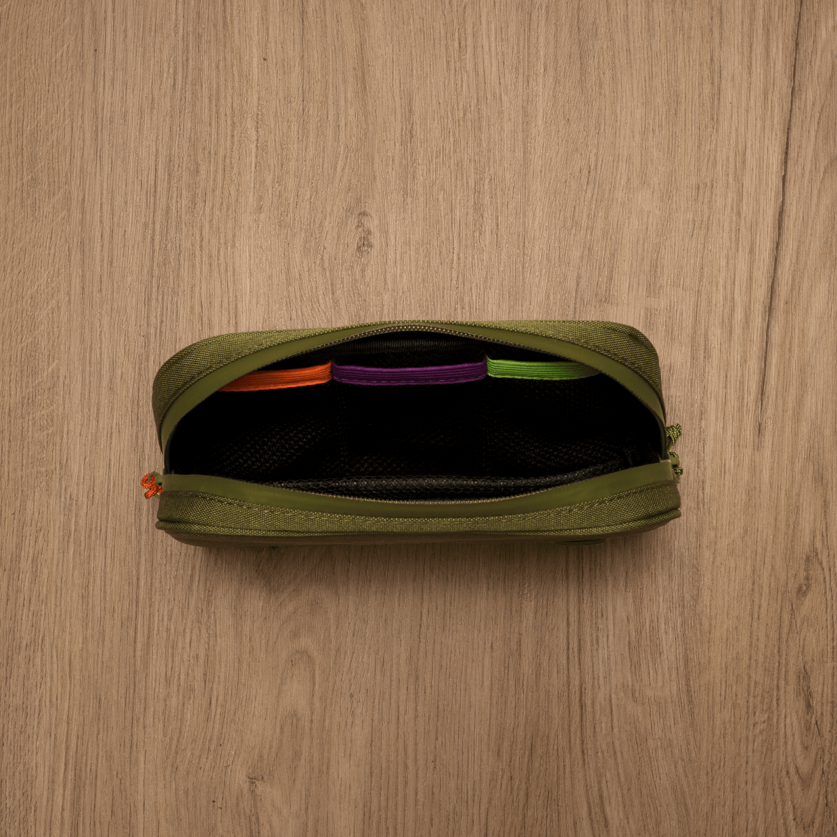 Overhead view of the open Carbon-lined Wallets with Combination Lock V 2.0| revealing a dark interior and zip closure.