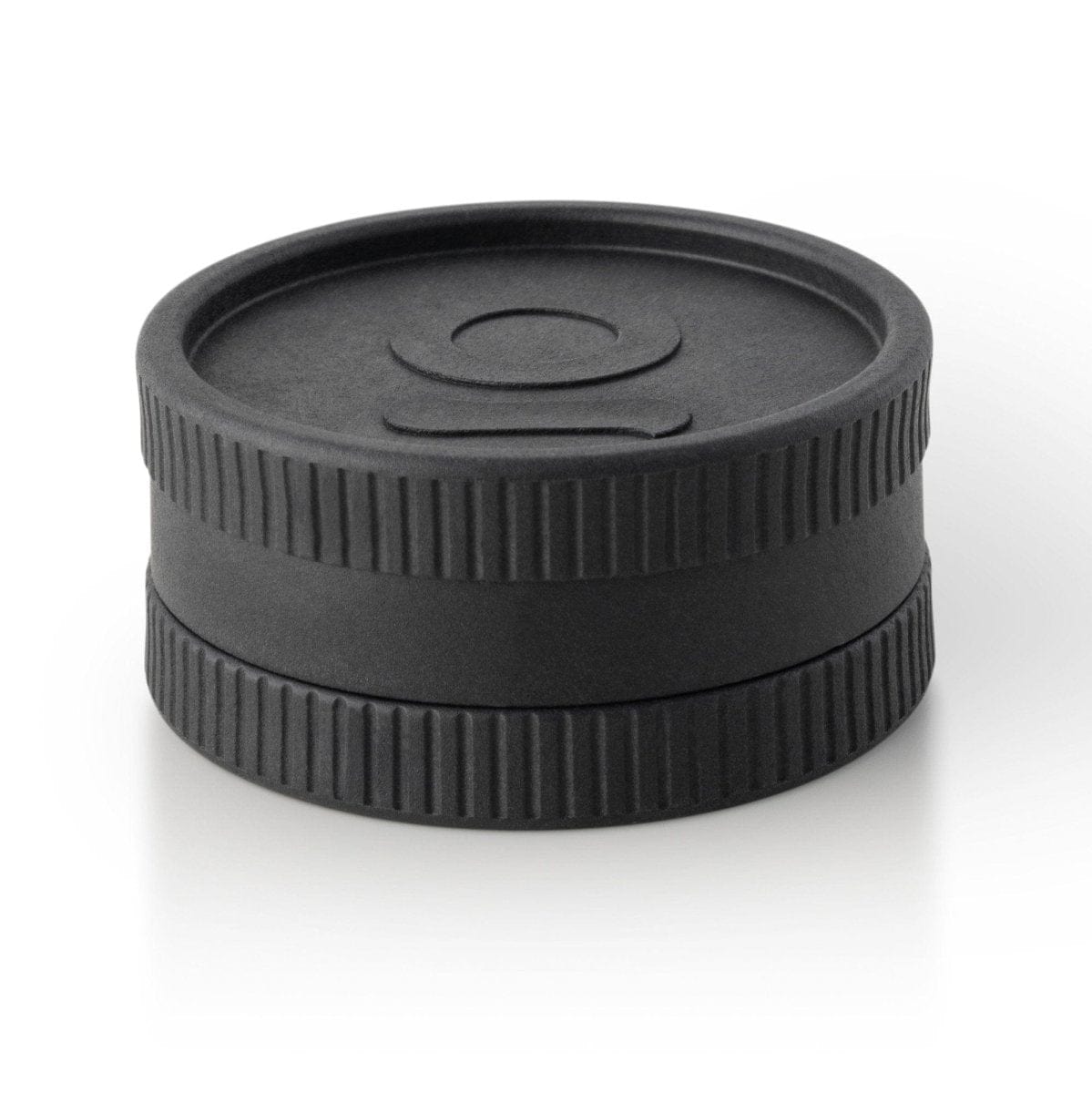 Front view of the Plant-Based Hemp Grinder, a dark, cylindrical device with textured bands, isolated on a white background.