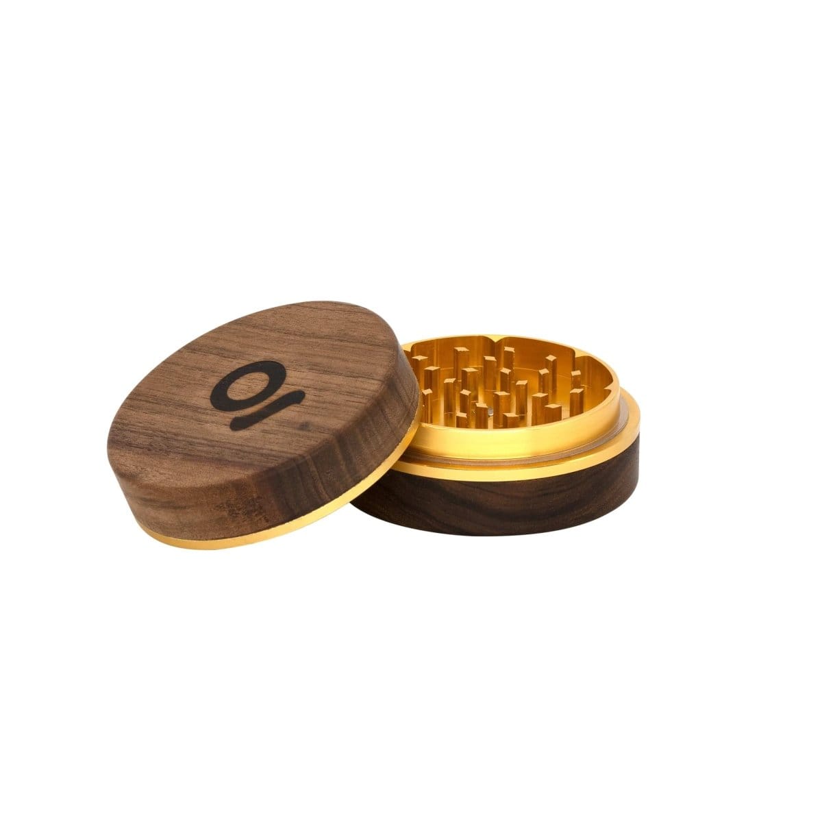 A top-down view of the open 3 Inch, 2-Piece Walnut Grinder, revealing its textured grinding teeth inside the wooden shell.