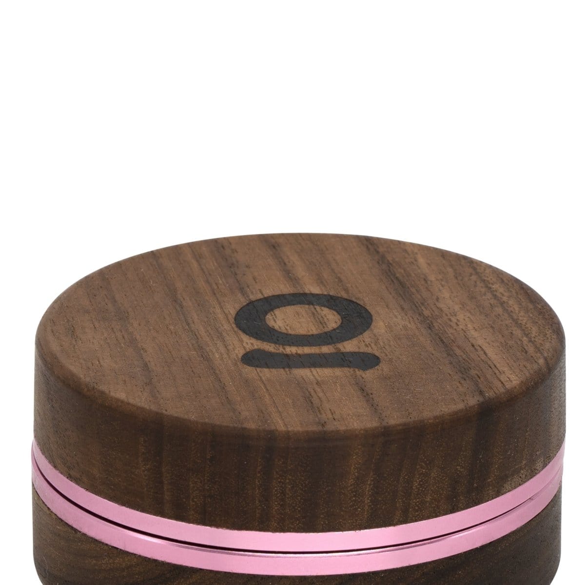 A close-up, top-down view of the 3 Inch, 2-Piece Walnut Grinder, showcasing its textured, wooden construction and circular design.