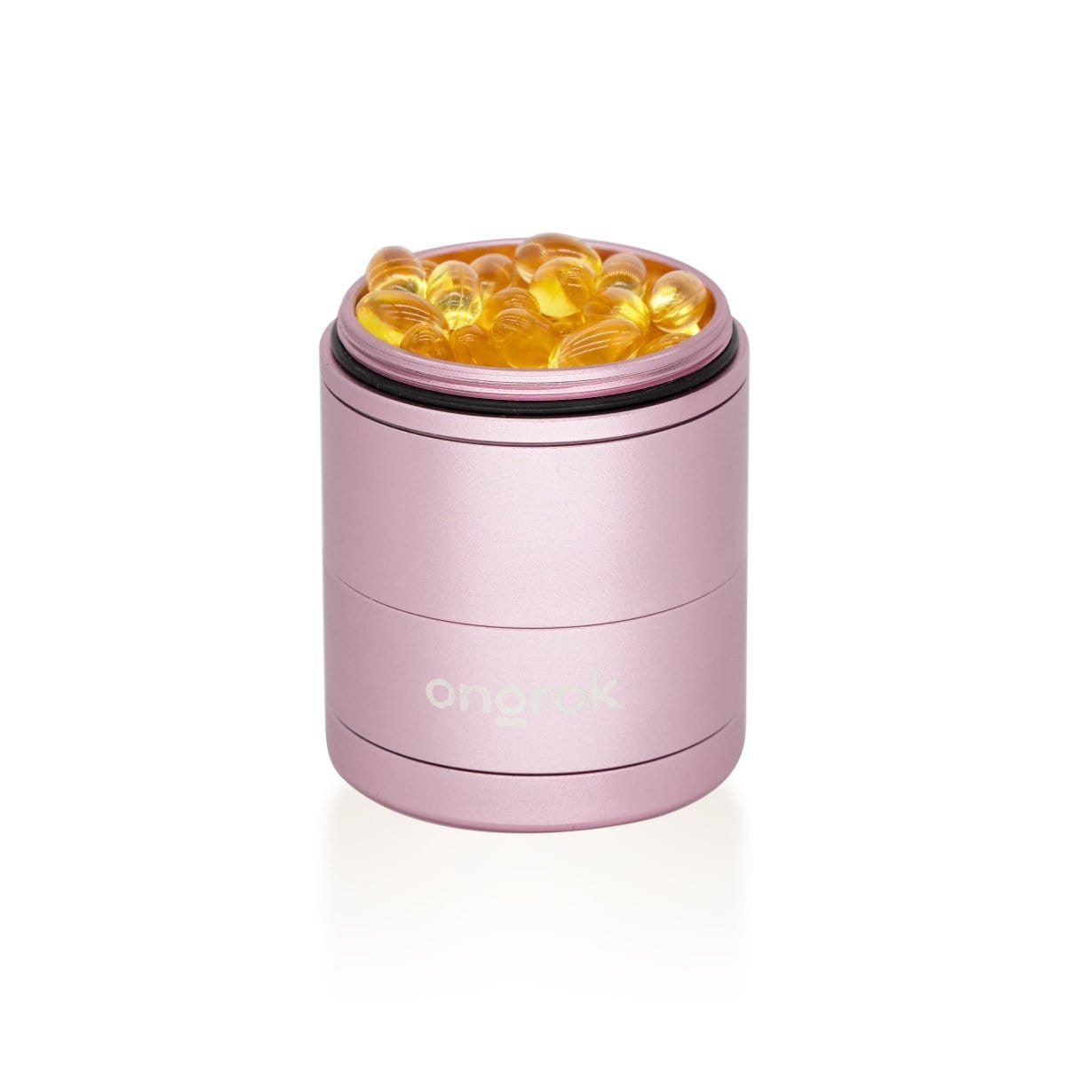 A close-up, top-down view of the 5 Piece Storage Grinder, showcasing its contents and metallic finish.