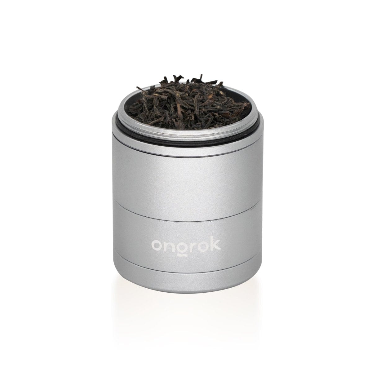 A top-down view of the 5 Piece Storage Grinder, showcasing its layered, cylindrical design in a metallic finish.