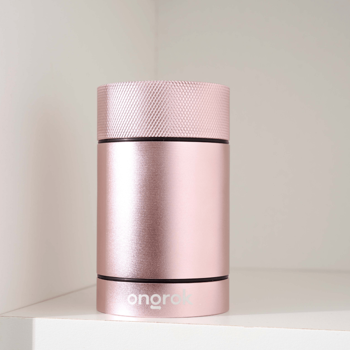 A close-up, angled view of the Aluminum Metal Storage Jar, showcasing its smooth, metallic finish and cylindrical shape.
