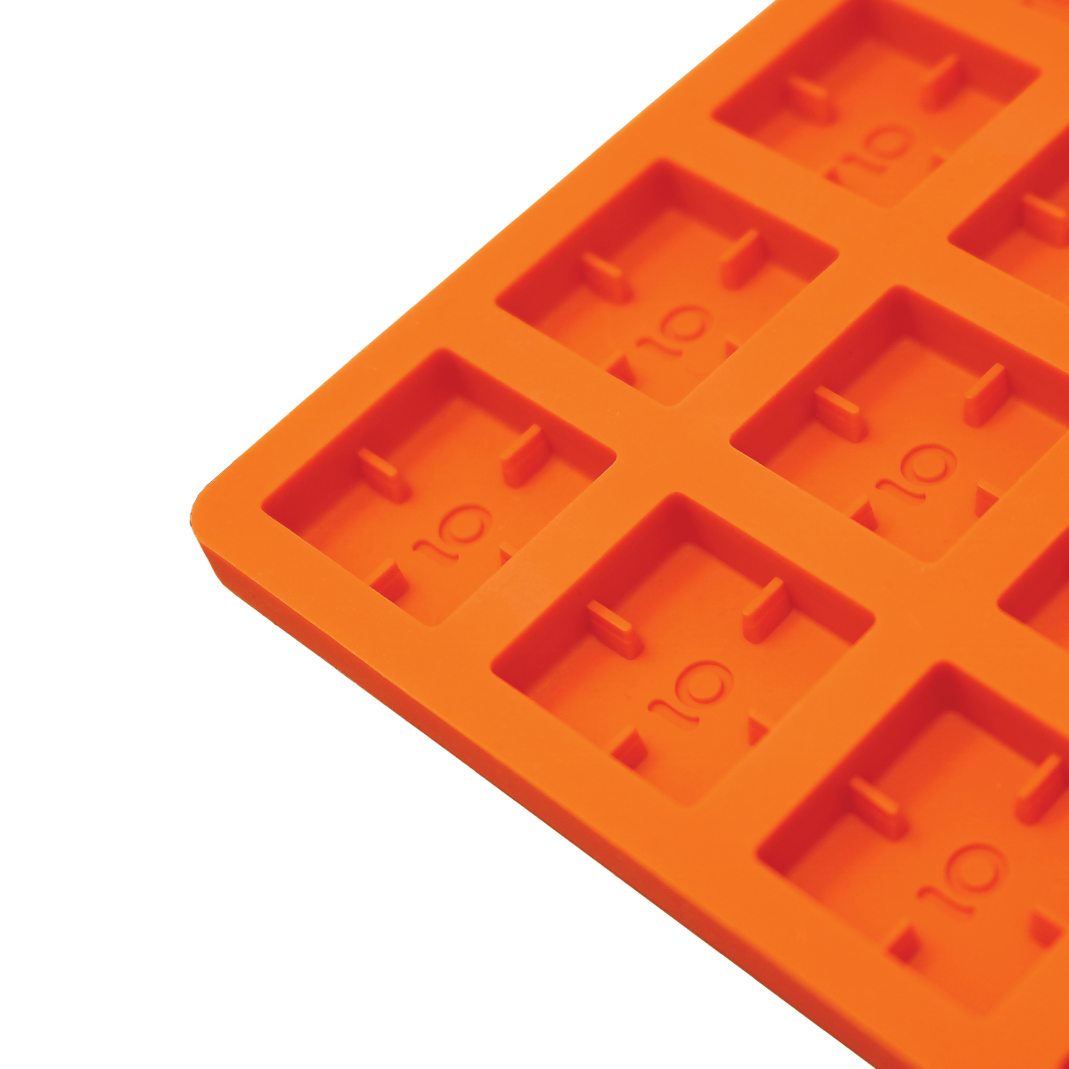 A top-down view of the Scored Gummy Molds, featuring an orange, grid-like silicone tray with defined square cavities.