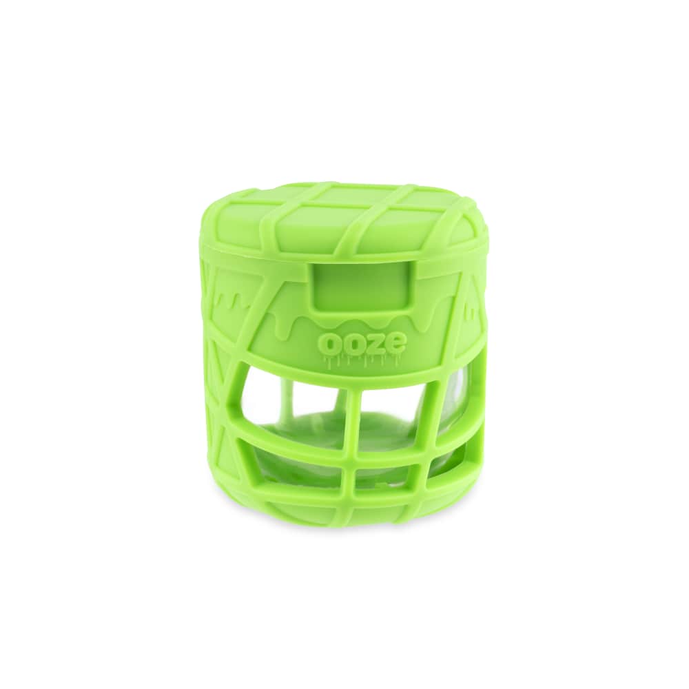Front view of the Ooze Prizm Silicone-Wrapped Glass Stash Jar, showing its circular shape and green silicone exterior.