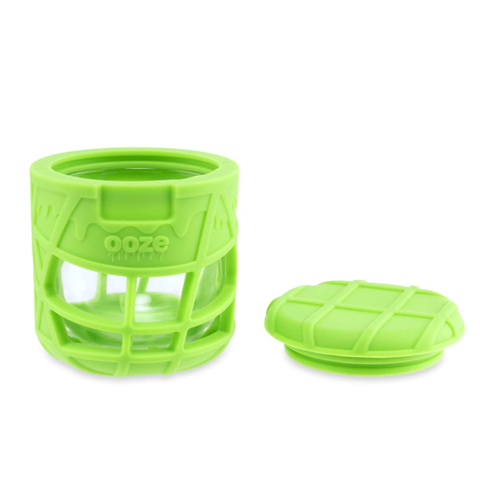 Overhead view of the Ooze Prizm Silicone-Wrapped Glass Stash Jar, with a closed lid on a white background.