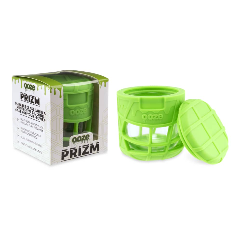 A slightly angled view of the Ooze Prizm Silicone-Wrapped Glass Stash Jar, showing the green silicone exterior and clear glass interior.