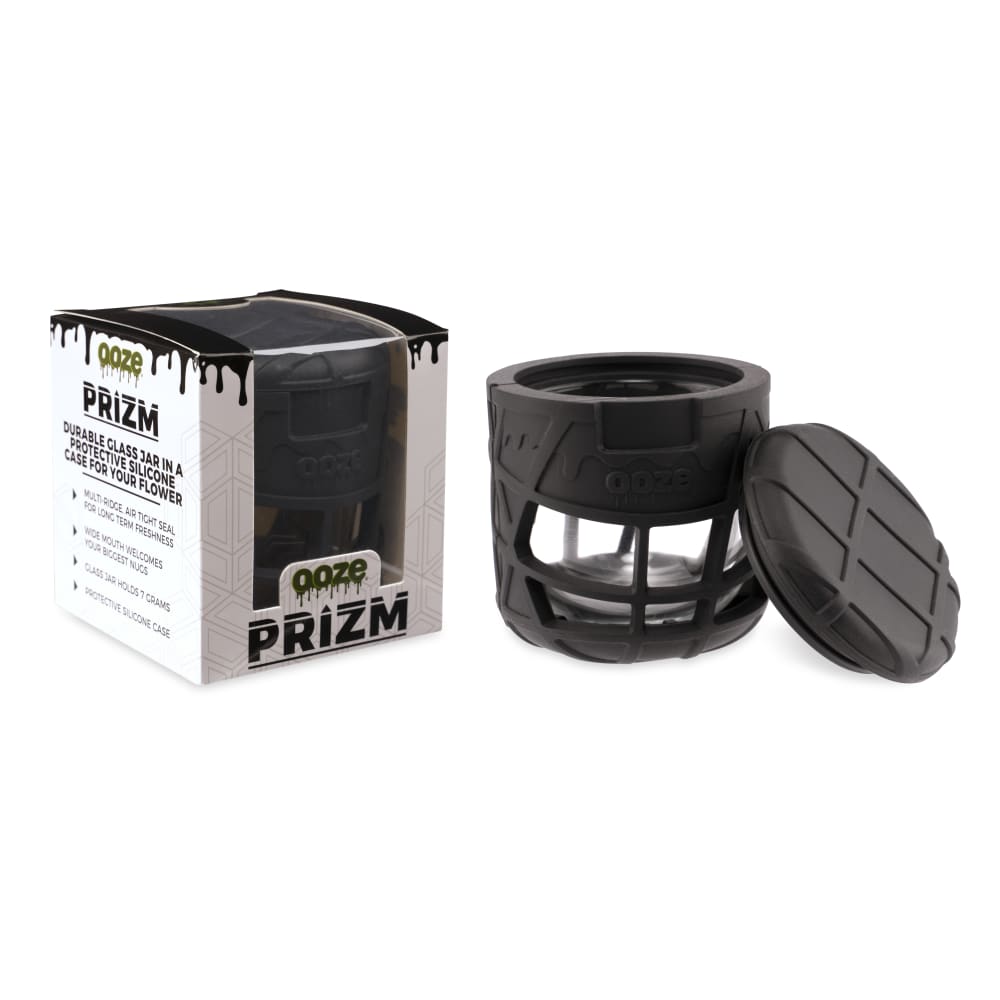Front view of the Ooze Prizm Silicone-Wrapped Glass Stash Jar, showing a dark container with a clear glass interior.