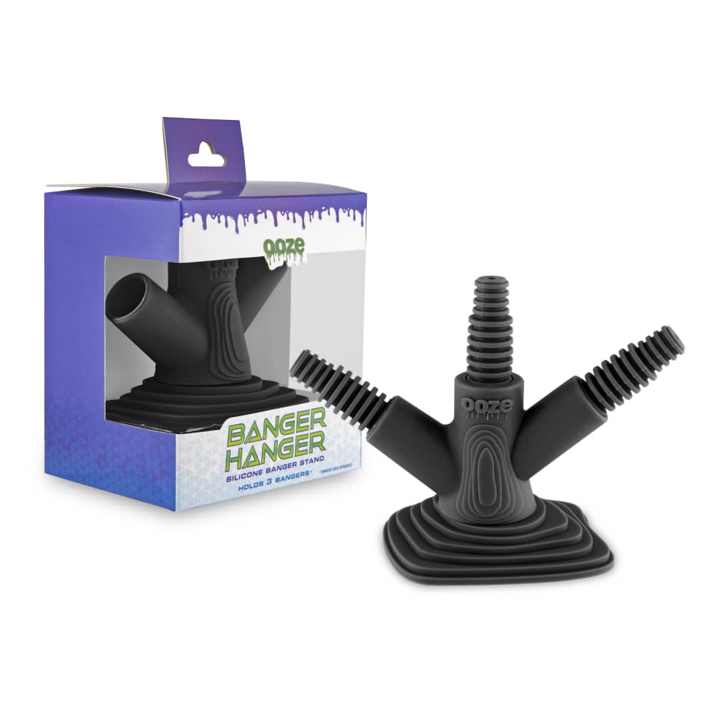A studio shot displays the Ooze Banger Hanger Silicone Banger Stand, showcasing its rounded shape and black color.