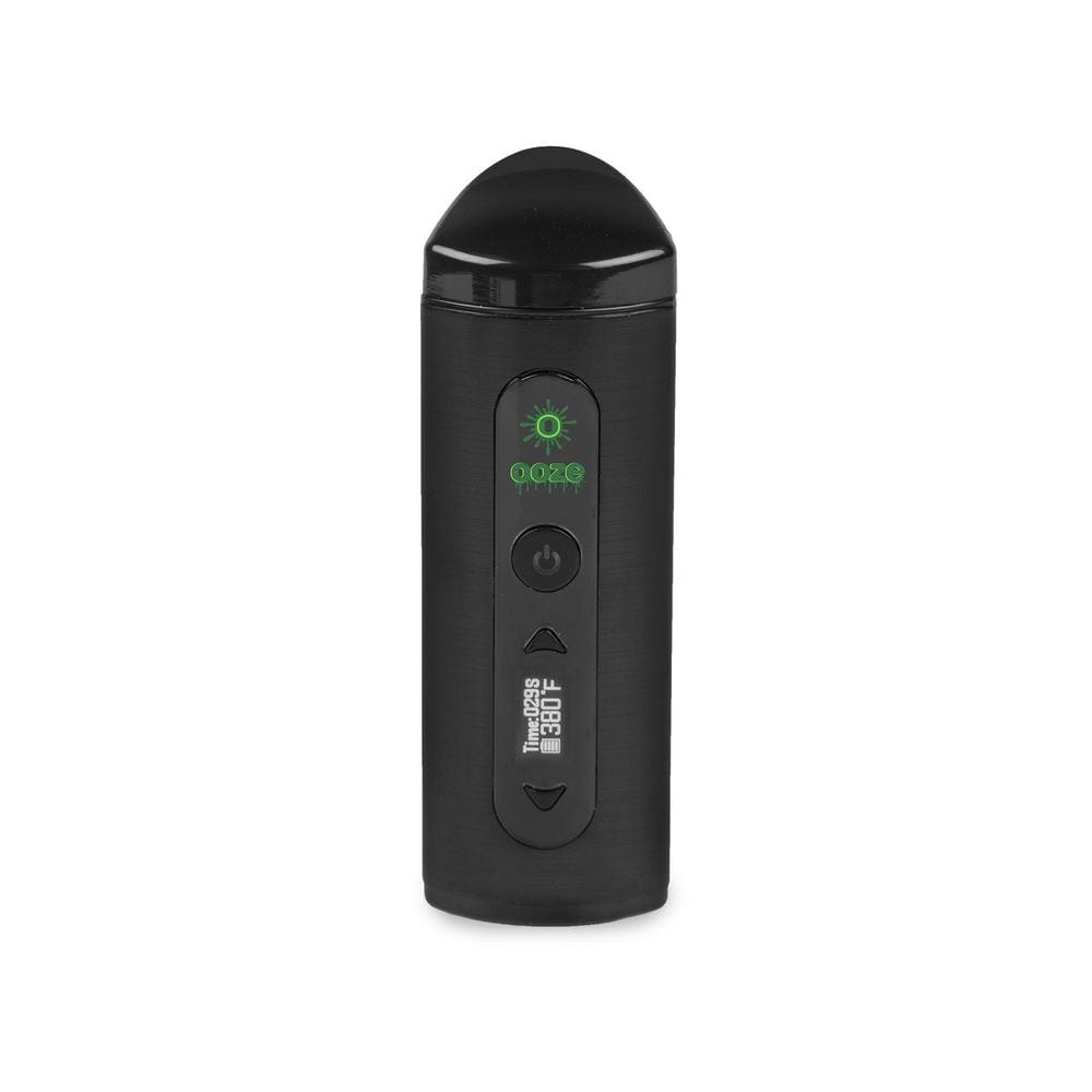 A front view of the Ooze Drought Dry Herb Vaporizer Kit, showing a sleek, black handheld device with a small digital display.