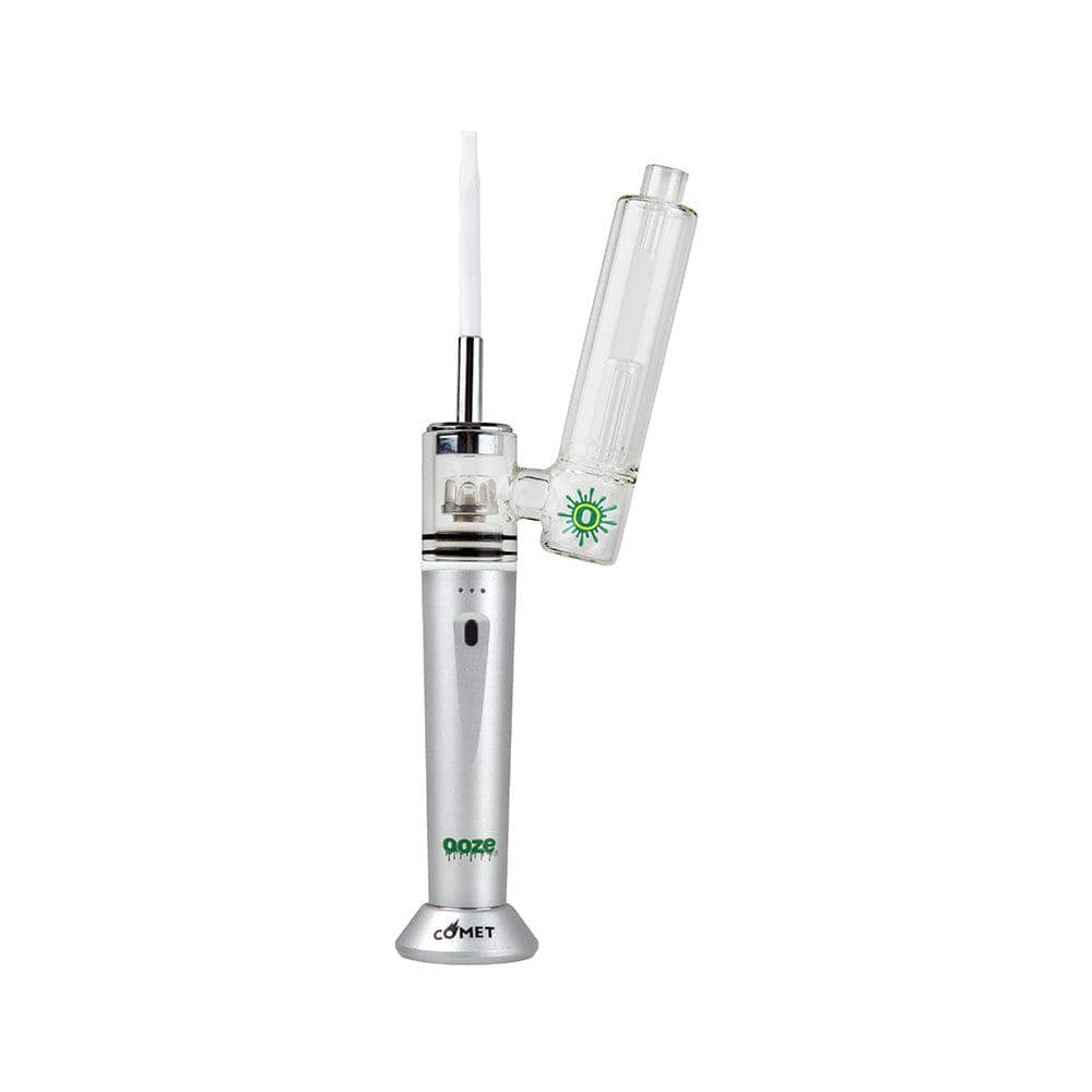 The Ooze Comet eNail Vaporizer Kit is shown in a studio shot with a silver body and a clear glass attachment.