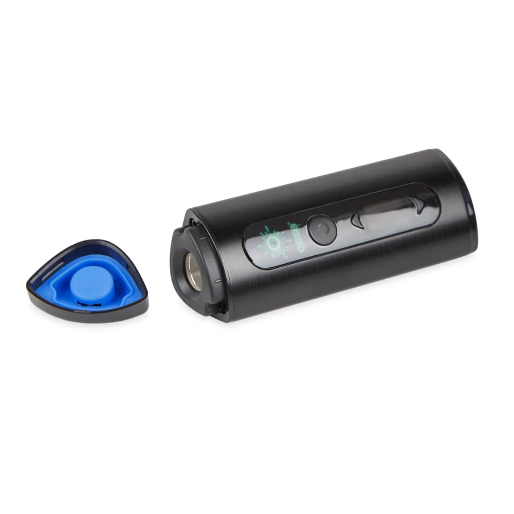 A close-up of the open Ooze Drought Dry Herb Vaporizer Kit, showing the internal chamber and black exterior finish.