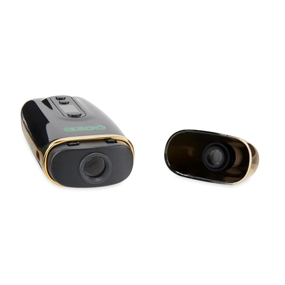 Top-down view of the open Ooze Flare Dry Herb Vaporizer, revealing the heating chamber and internal components against a neutral backdrop.