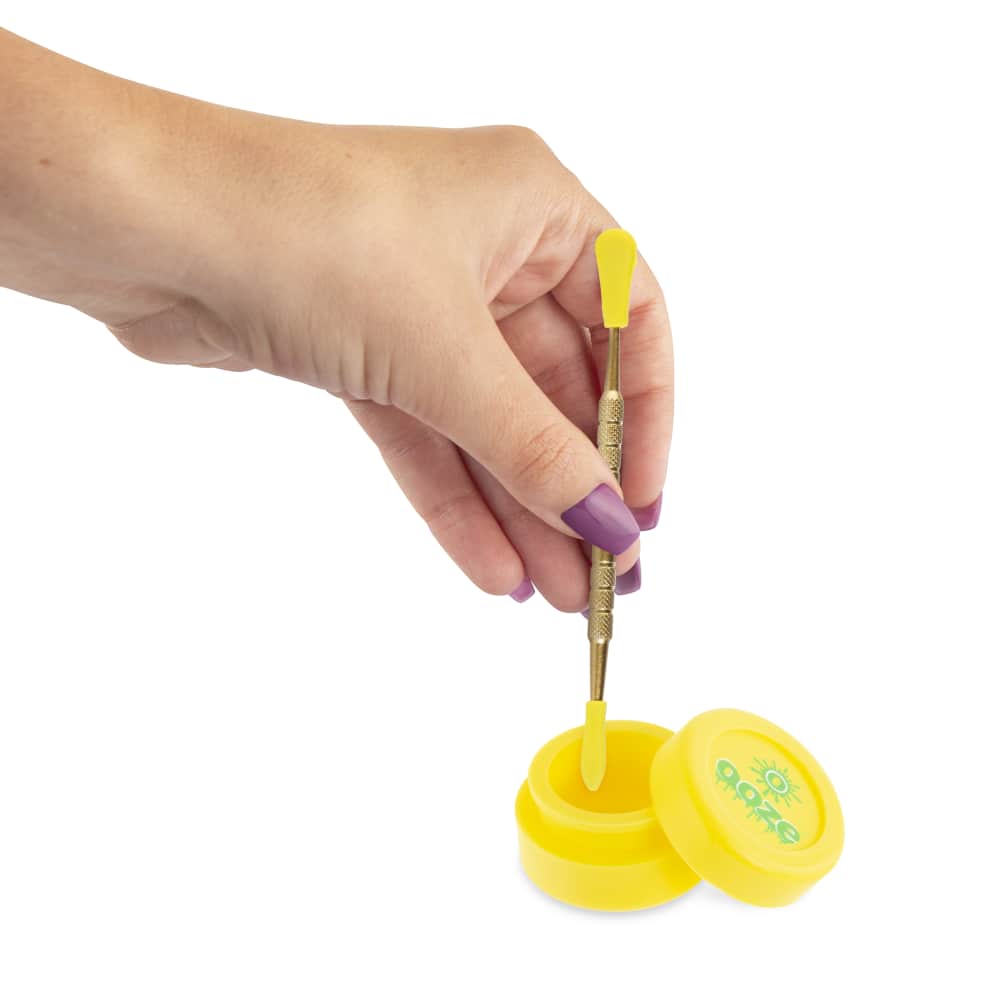 A hand holds the silver Ooze Fusion Atomizer Vape Battery against a plain white background.