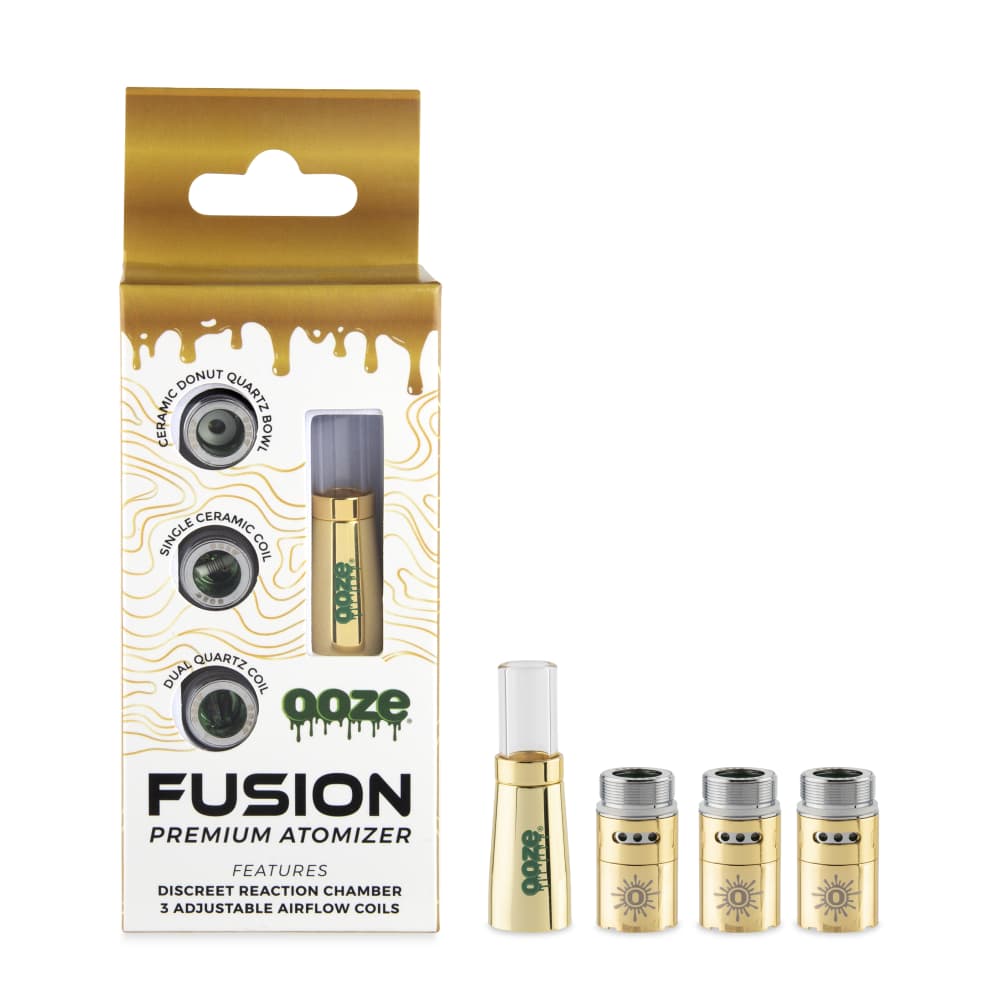 A side view of the Ooze Fusion Vape Atomizer, showcasing the transparent glass body and metallic connection details.