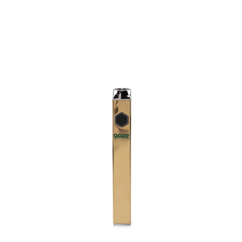 A studio shot of the Ooze Quad 510 Thread 500 mAh Square Vape Pen Battery, showcasing its sleek, square gold design.