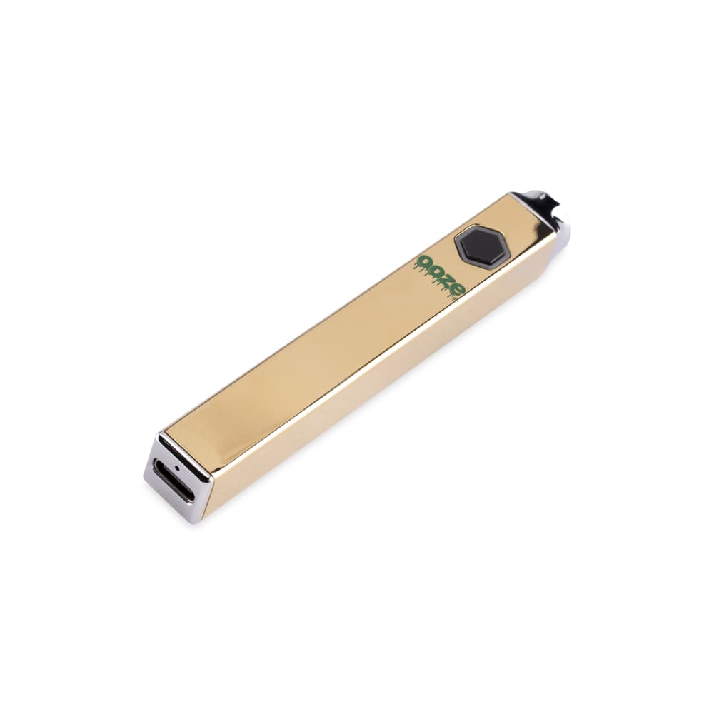 A three-quarter view of the gold-colored Ooze Quad 510 Thread 500 mAh Square Vape Pen Battery against a plain white backdrop.