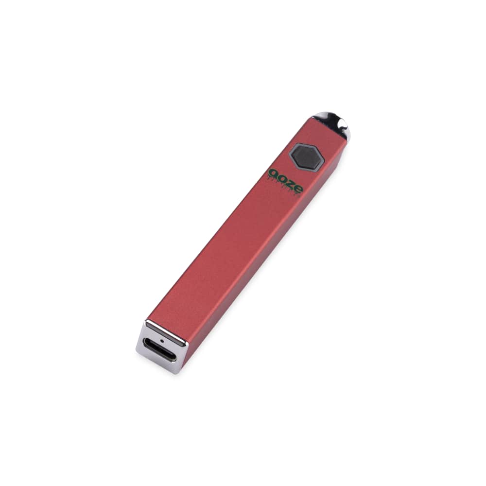 A diagonal view of the Ooze Quad 510 Thread 500 mAh Square Vape Pen Battery, displaying its rectangular, metallic finish.