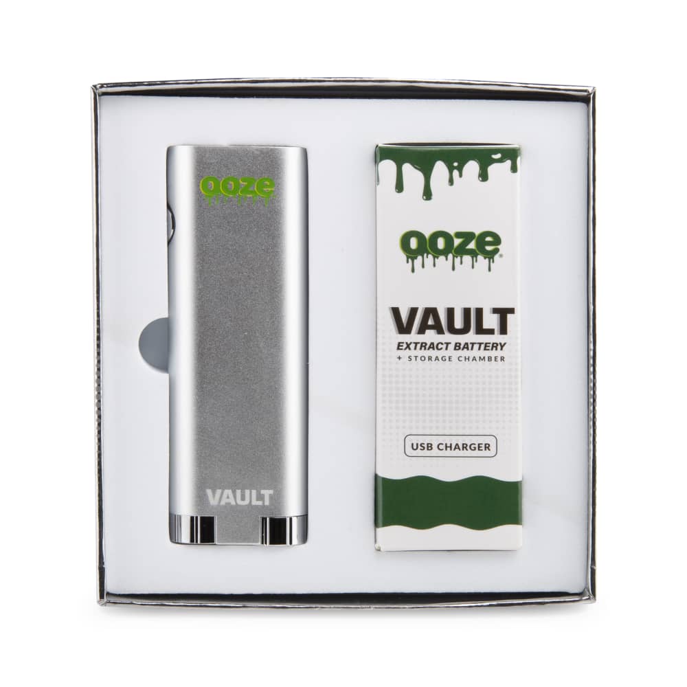 Front view of the Ooze Vault Extract Battery with Storage Chamber, presented in its box with the brand logo visible on the packaging.