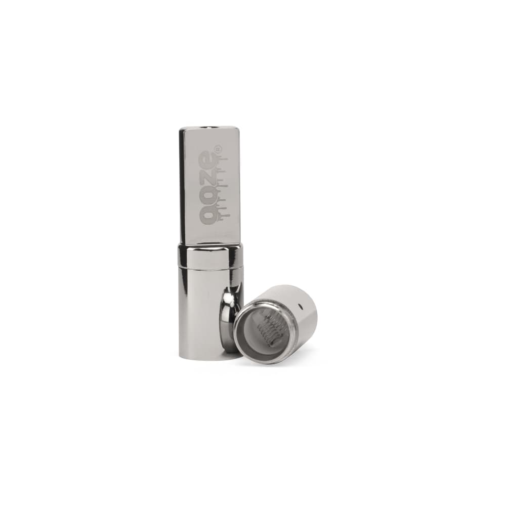 A close-up shows the silver Ooze Vault Extract Battery with Storage Chamber angled slightly, highlighting its sleek cylindrical shape.
