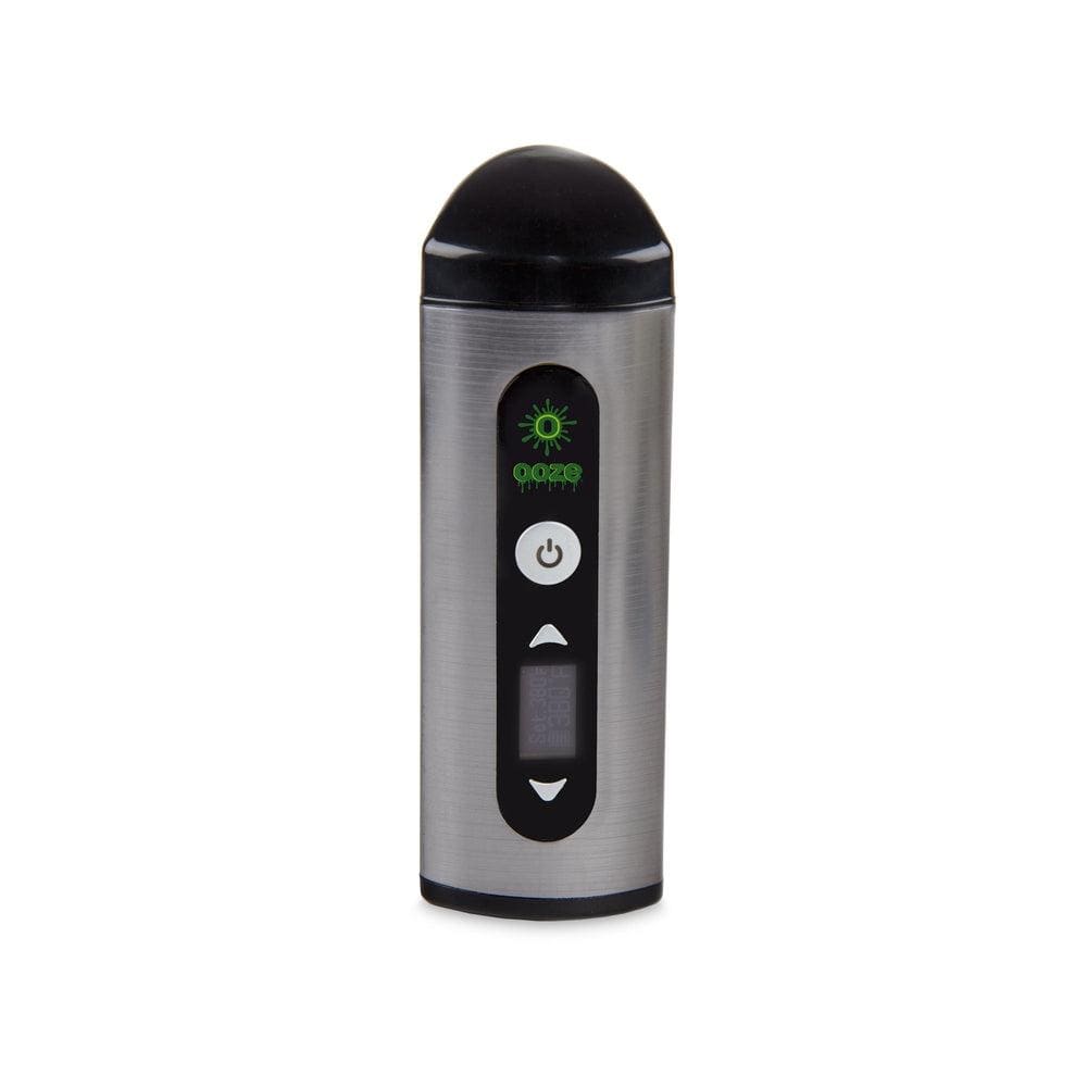 Front view of the Ooze Drought Dry Herb Vaporizer Kit, a silver, pen-shaped device with a small display screen.