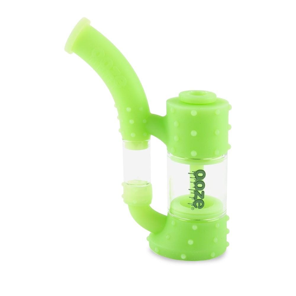 A front view of the Ooze Stack Pipe Silicone Bubbler, showcasing its green, textured design against a plain white background.