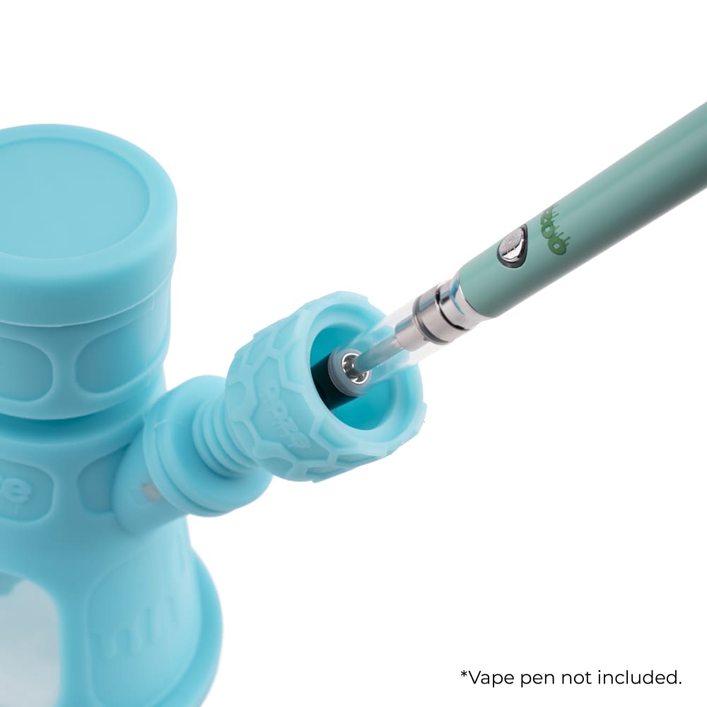 Close-up view of the Ooze Hyborg Silicone Glass 4-in-1 Hybrid Water Pipe and Nectar Collector’s joint, with a metal tip inserted.
