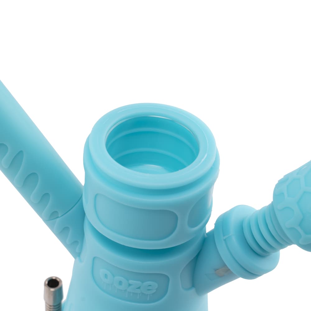 Close-up view of the Ooze Hyborg Silicone Glass 4-in-1 Hybrid Water Pipe and Nectar Collector’s mouthpiece, showcasing its open, circular design.