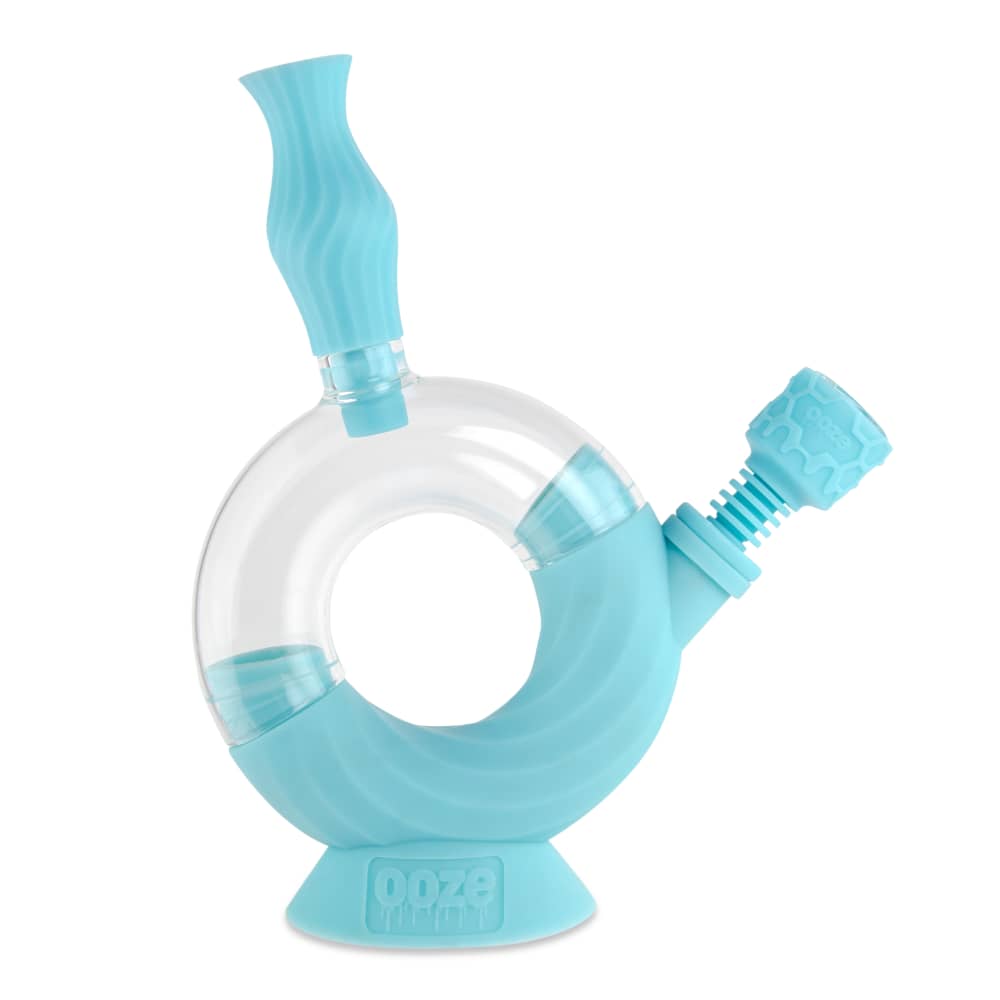 A studio shot of the Ooze Ozone Silicone Water Pipe and Dab Straw, showing its curved neck and clear silicone construction.