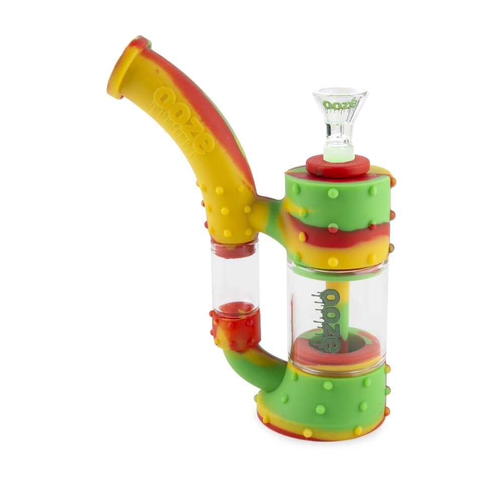A front view of the Ooze Stack Pipe Silicone Bubbler, featuring stacked green and red sections with a clear glass bowl.