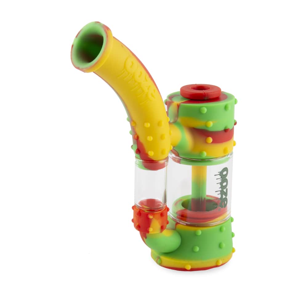 A close-up of the Ooze Stack Pipe Silicone Bubbler, featuring a textured green and clear design in a side view.