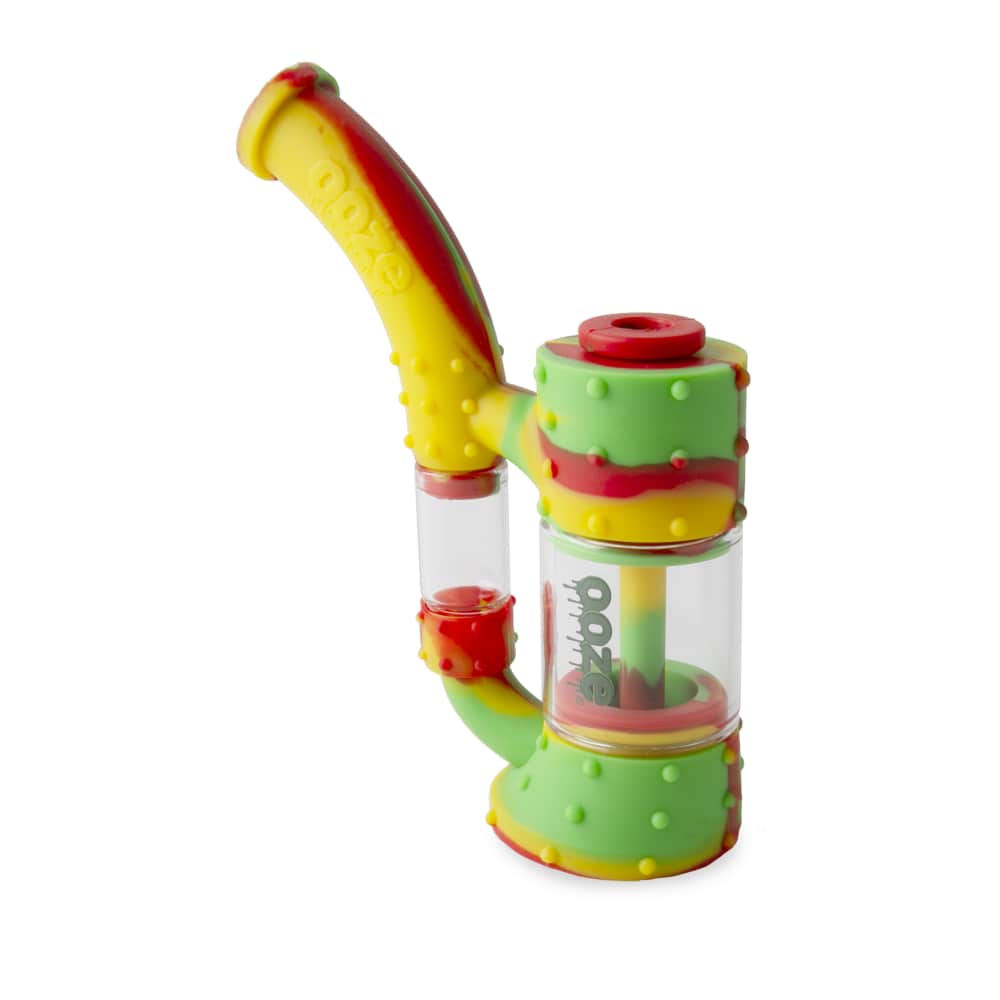 Front view of the Ooze Stack Pipe Silicone Bubbler, featuring a bright green and red design with a rounded shape.