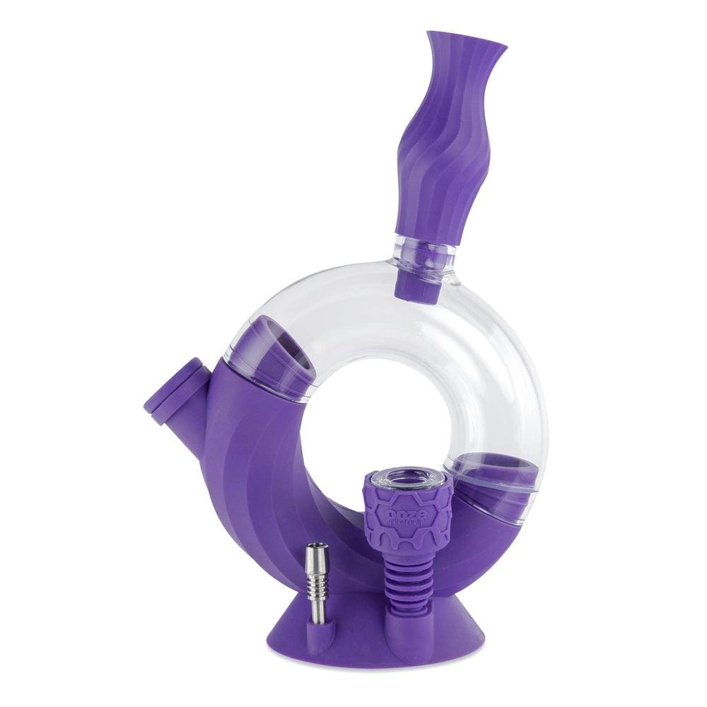 A studio shot of the Ooze Ozone Silicone Water Pipe and Dab Straw, displaying its curved neck and purple silicone material.