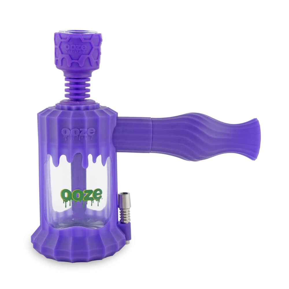 A studio shot of the Ooze Clobb Silicone Water Pipe and Dab Straw, showing the purple pipe angled slightly on a white background.