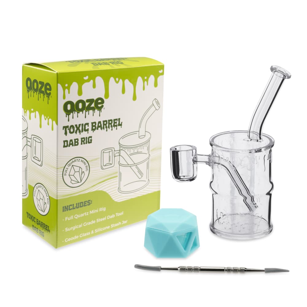 Front view of the Ooze Quartz Mini Rig - Toxic Barrel, showcasing its clear glass construction and simple, cylindrical design.